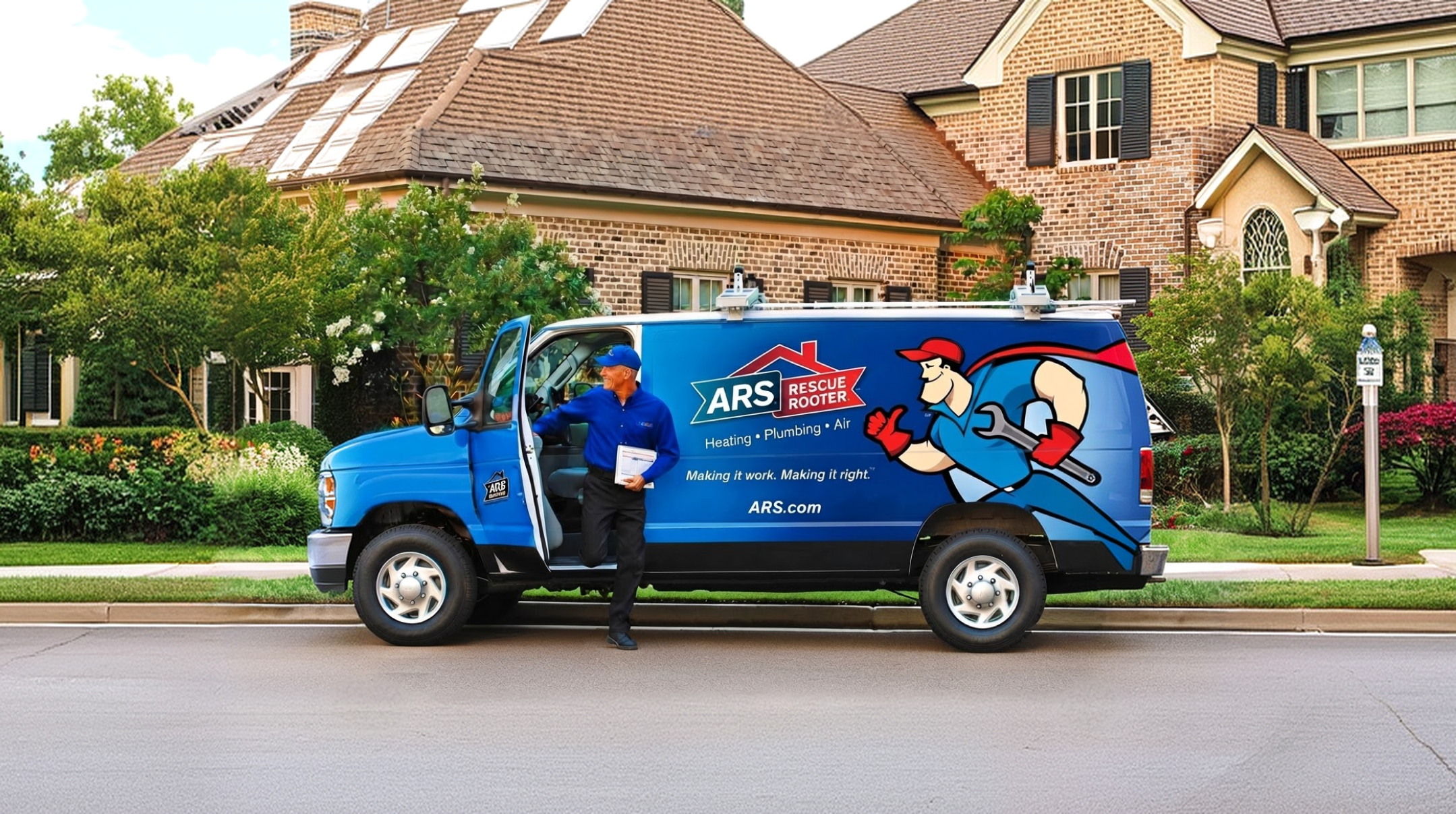 ARS / Rescue Rooter technician beside a service van